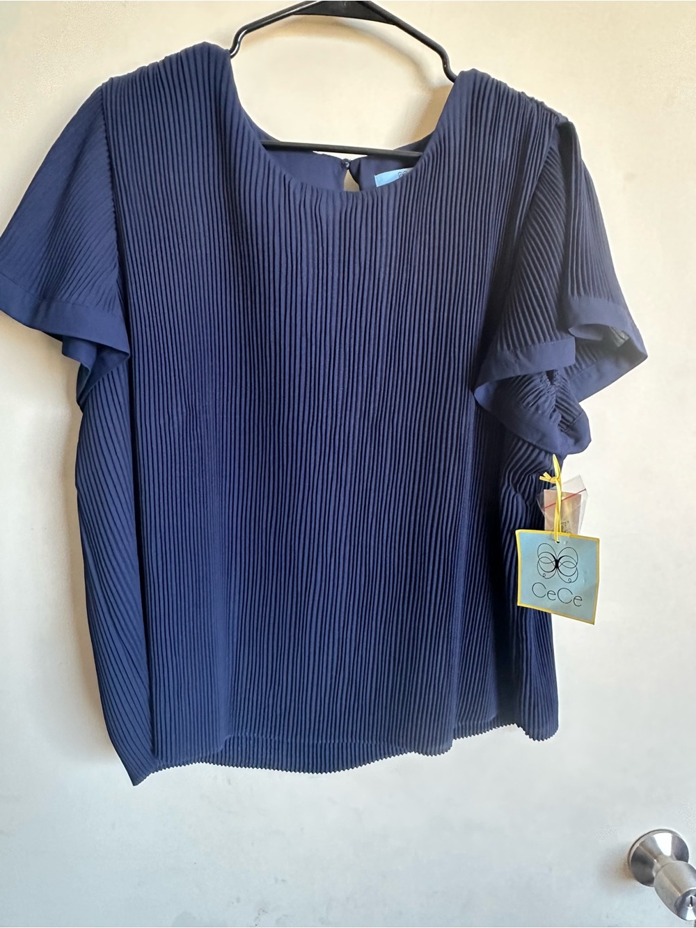CeCe Navy Pleated Short Sleeve Blouse with Ruffled Sleeves